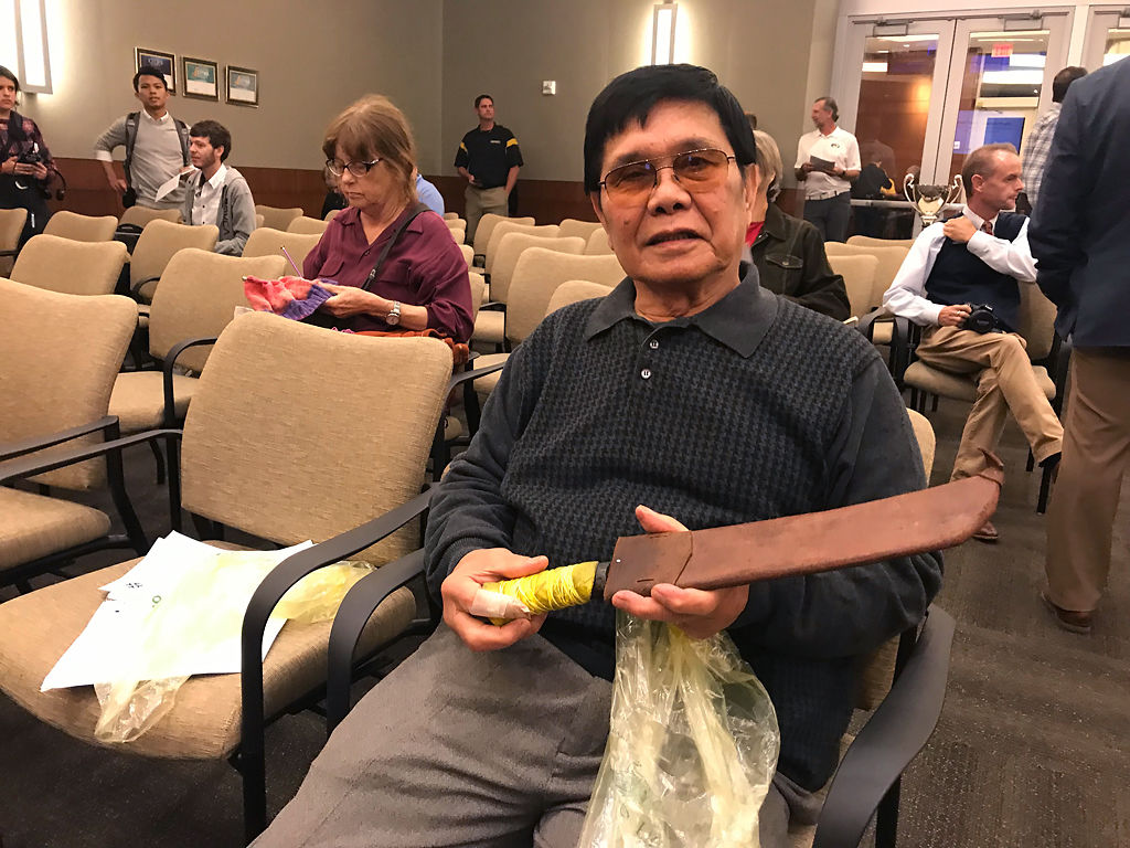 David Dizon Melegrito holds his bolo machete